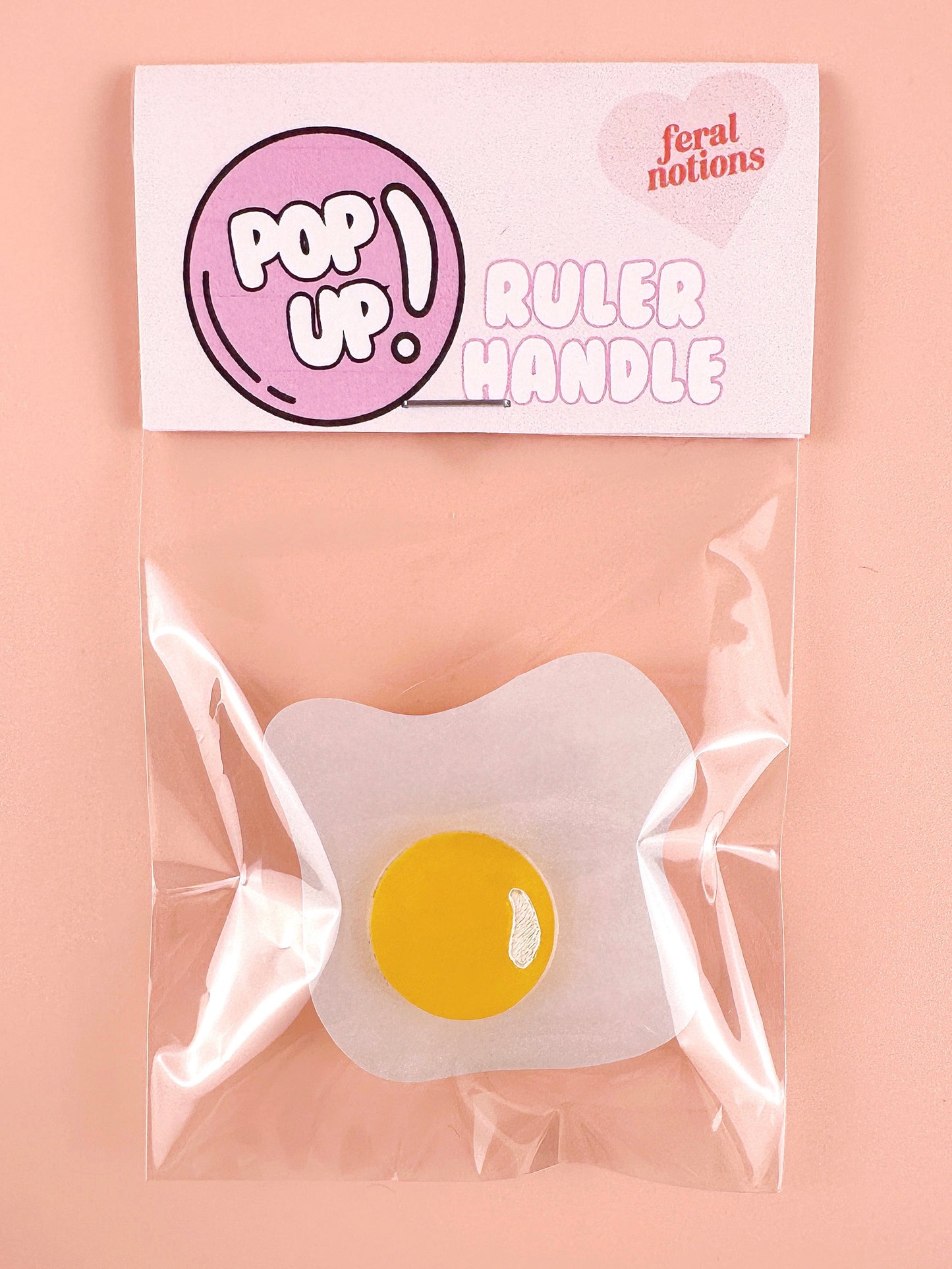 Over easy pop-up ruler handle