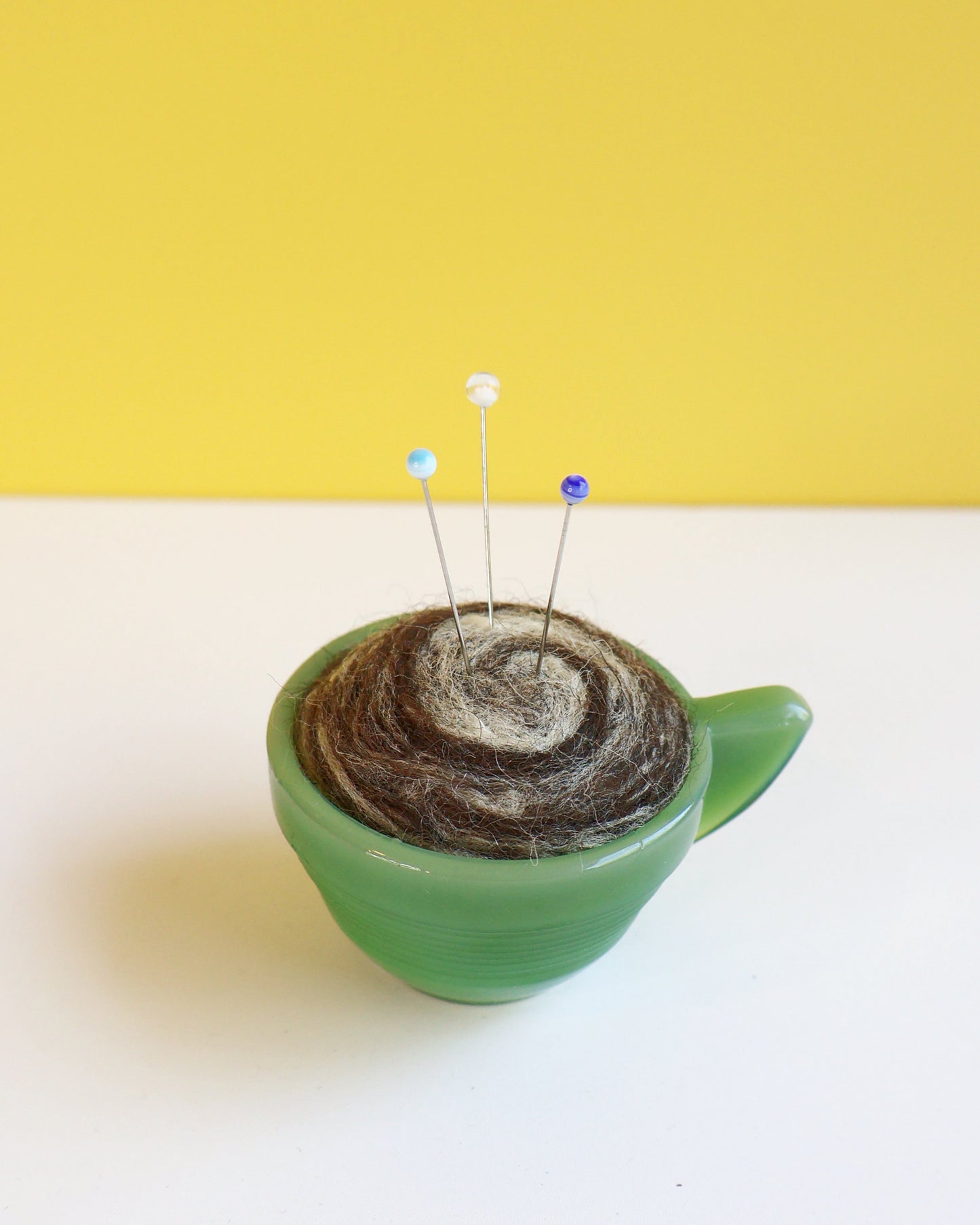 Marbled glass and wool pin cushion