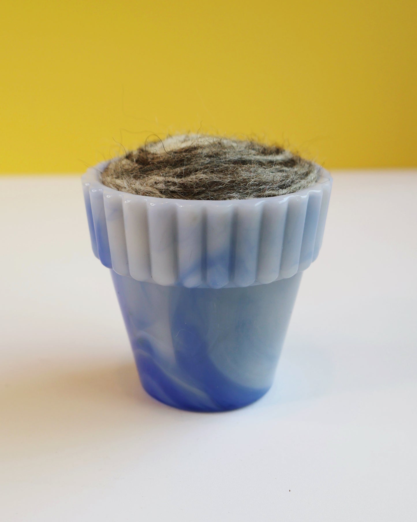 Marbled glass and wool pin cushion