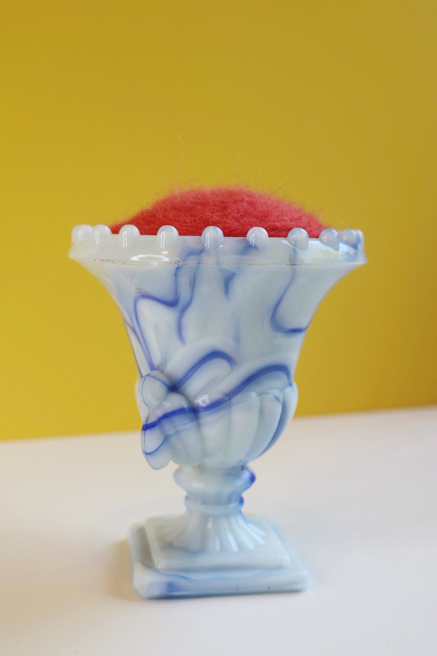 Marbled glass and wool pin cushion