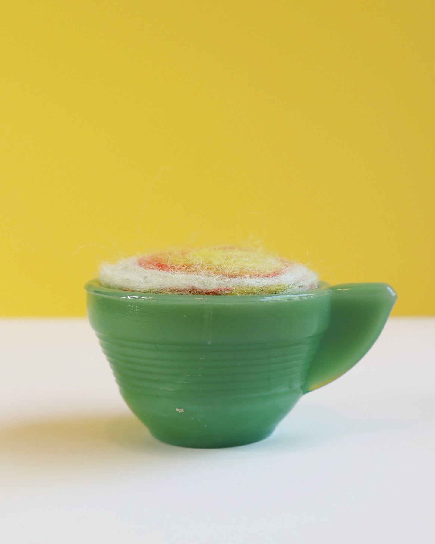 Marbled glass and wool pin cushion