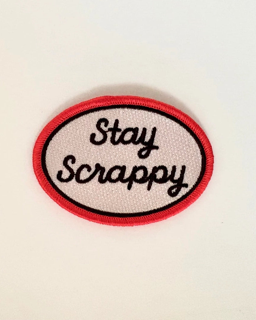 Patch with 'Stay Scrappy' text on a white background