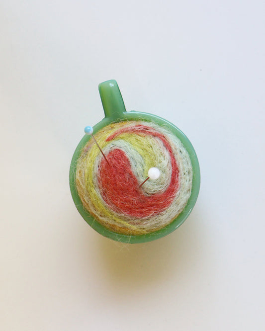 Marbled glass and wool pin cushion