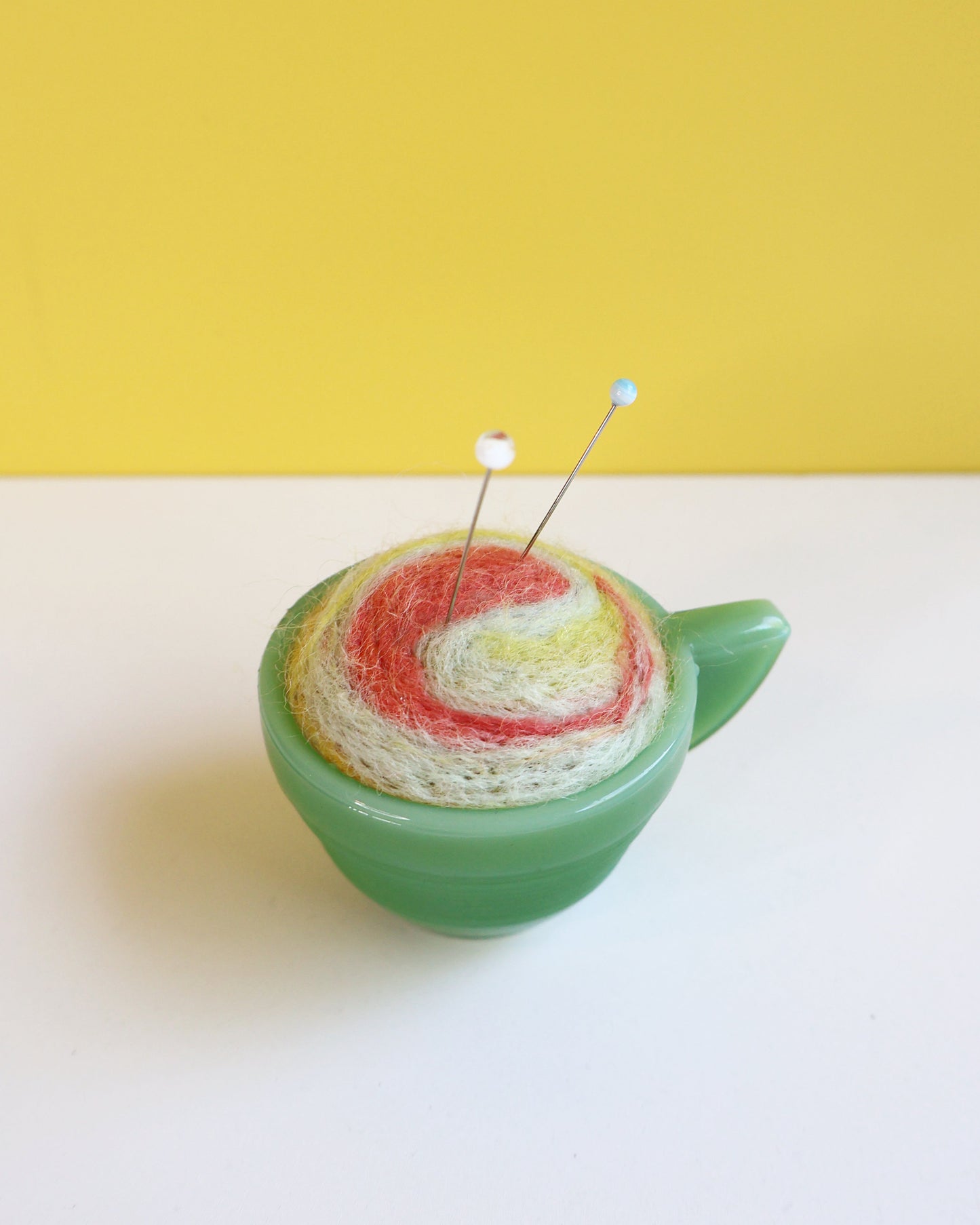 Marbled glass and wool pin cushion