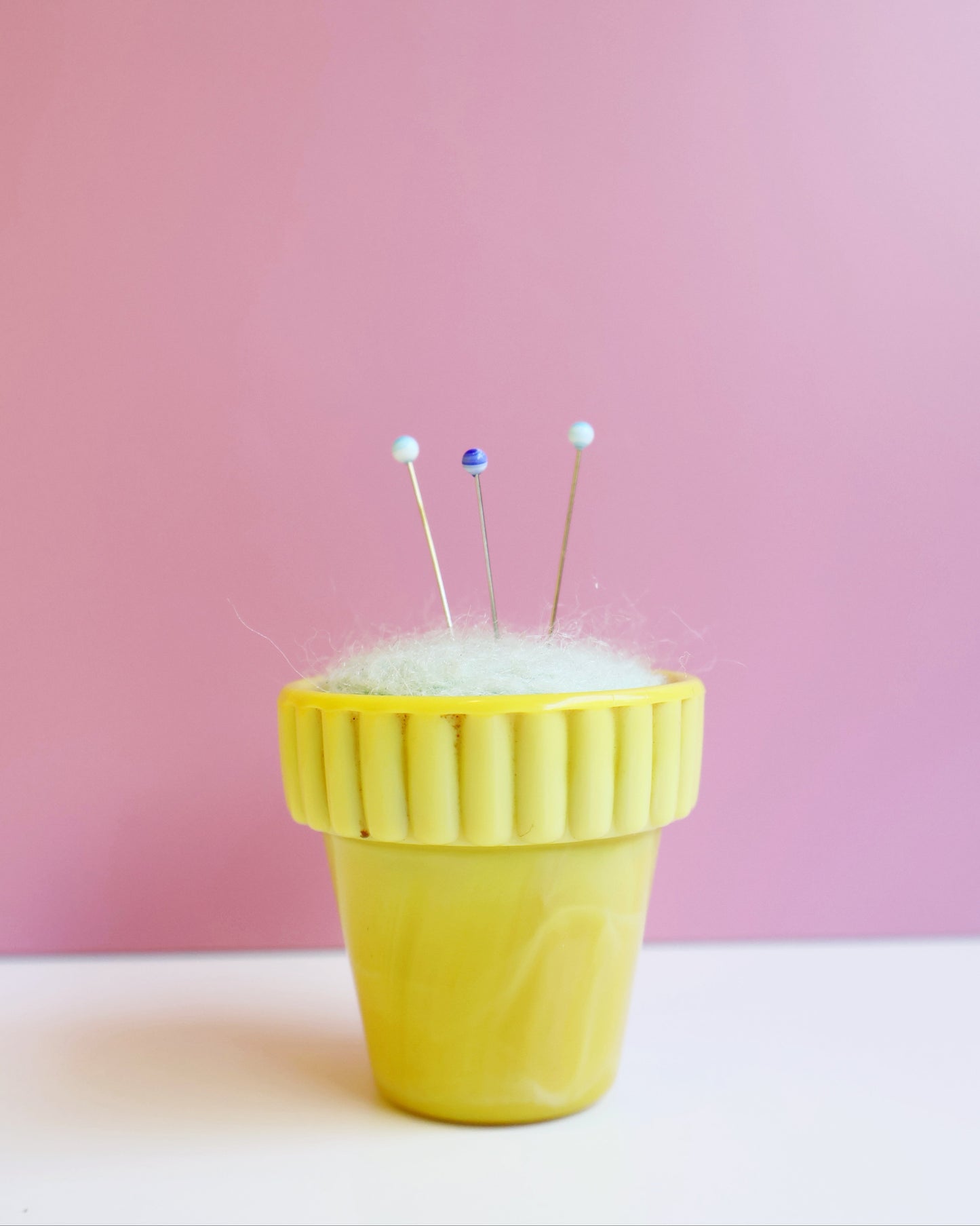 Marbled glass and wool pin cushion