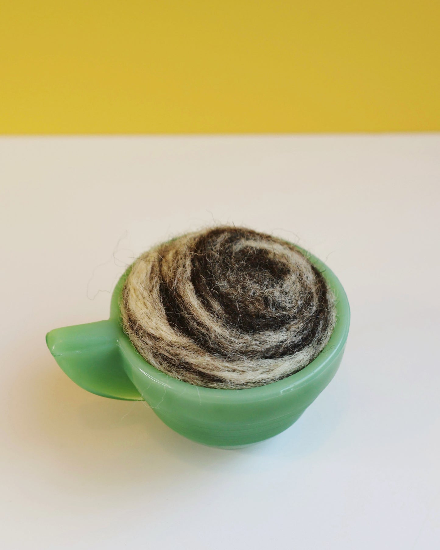 Marbled glass and wool pin cushion
