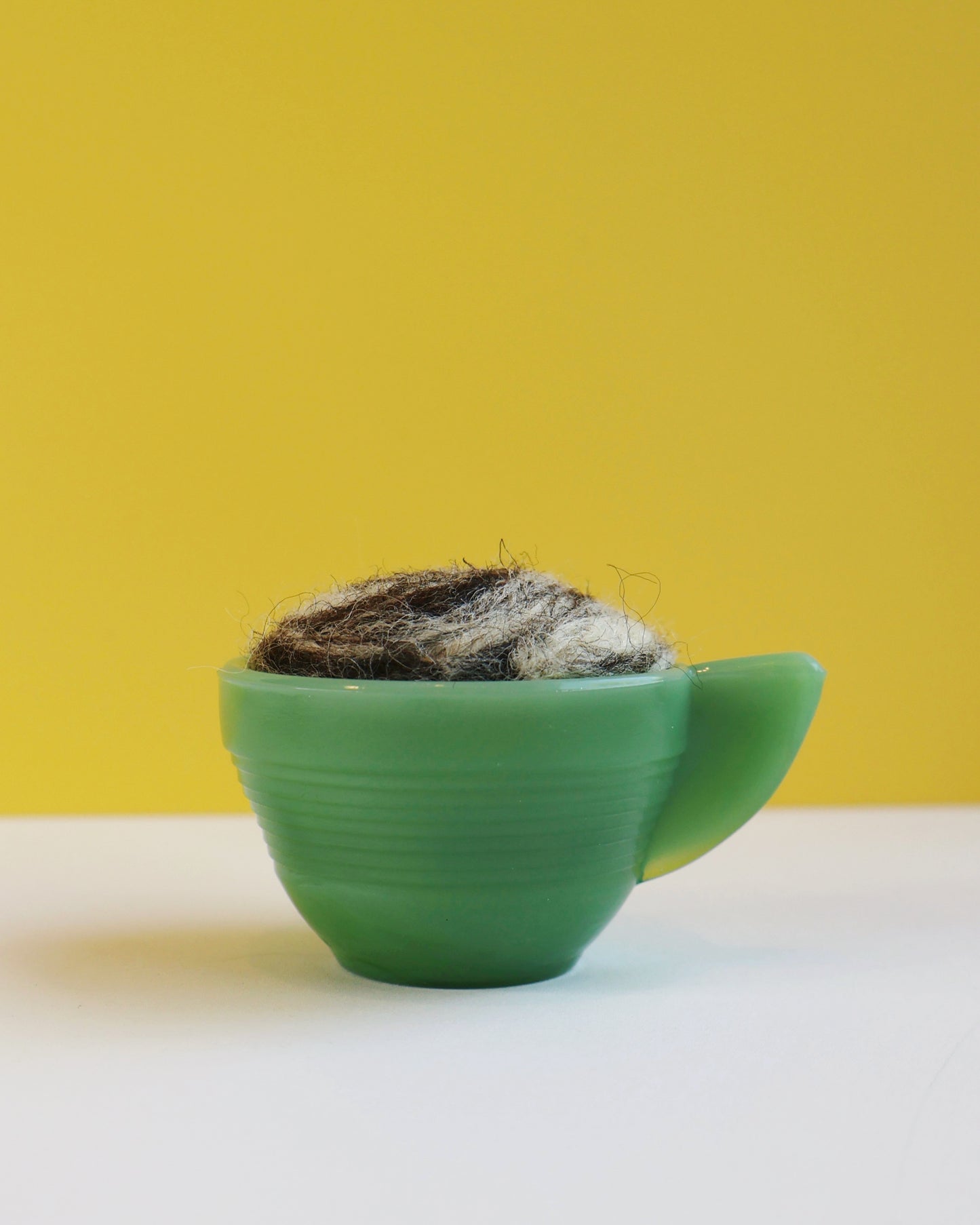 Marbled glass and wool pin cushion