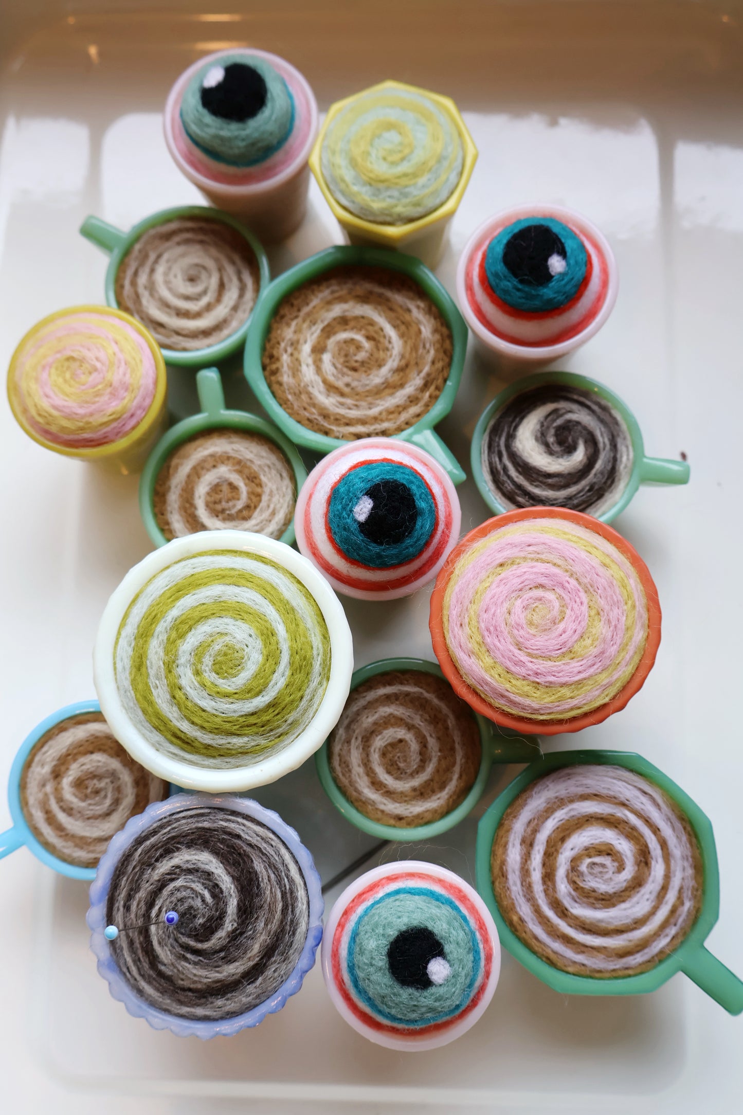 Orange glass and wool pin cushion