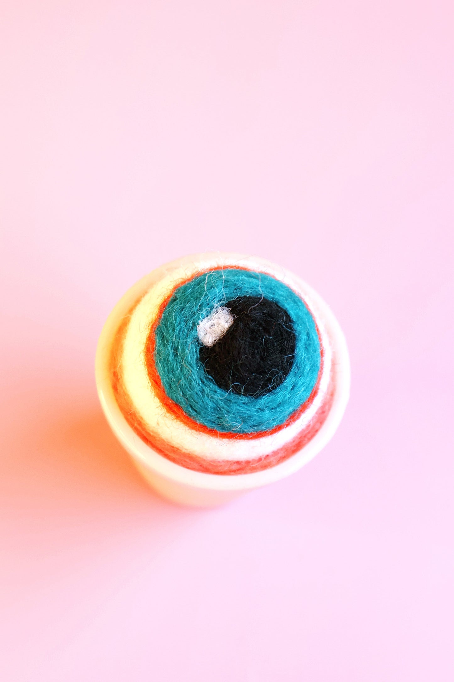 Eyeball glass and wool pin cushion