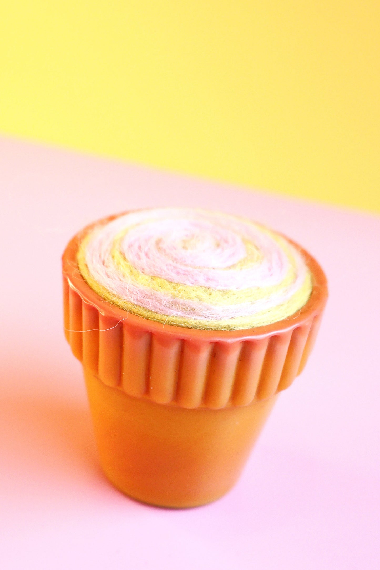 Orange glass and wool pin cushion