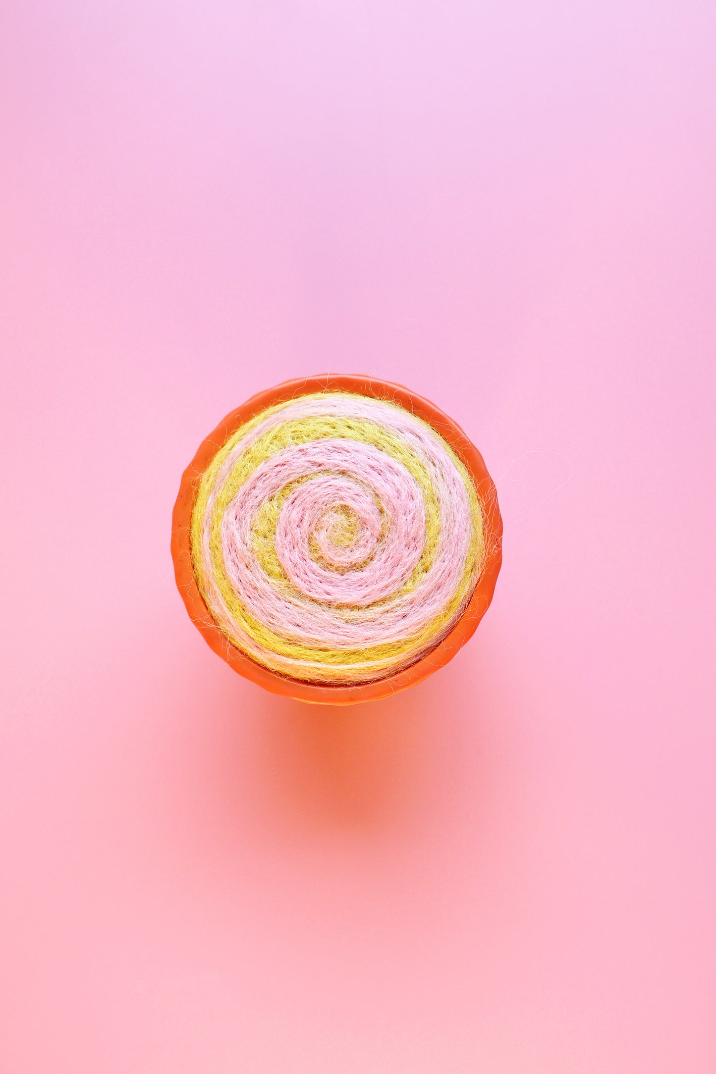 Orange glass and wool pin cushion