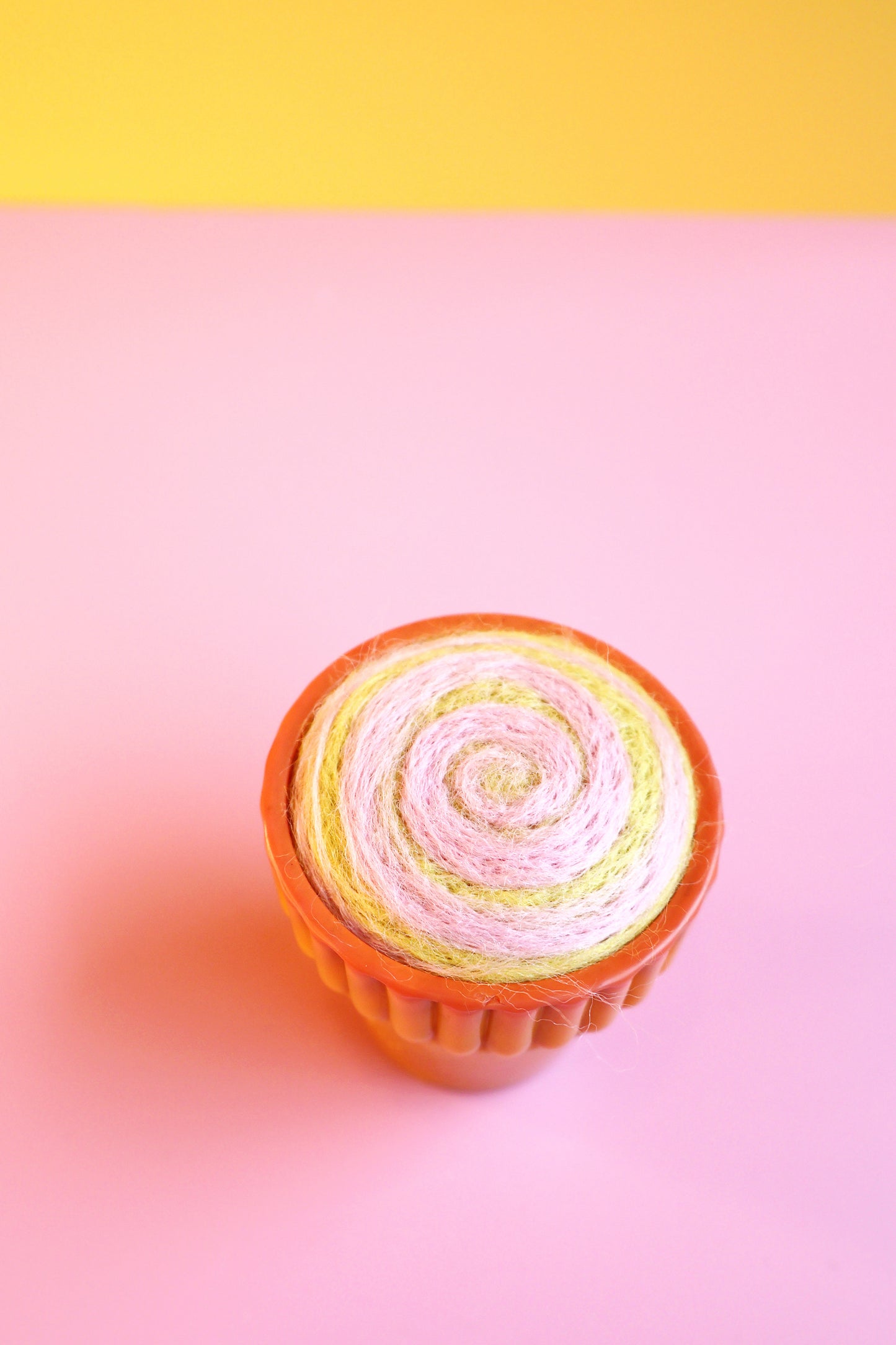 Orange glass and wool pin cushion