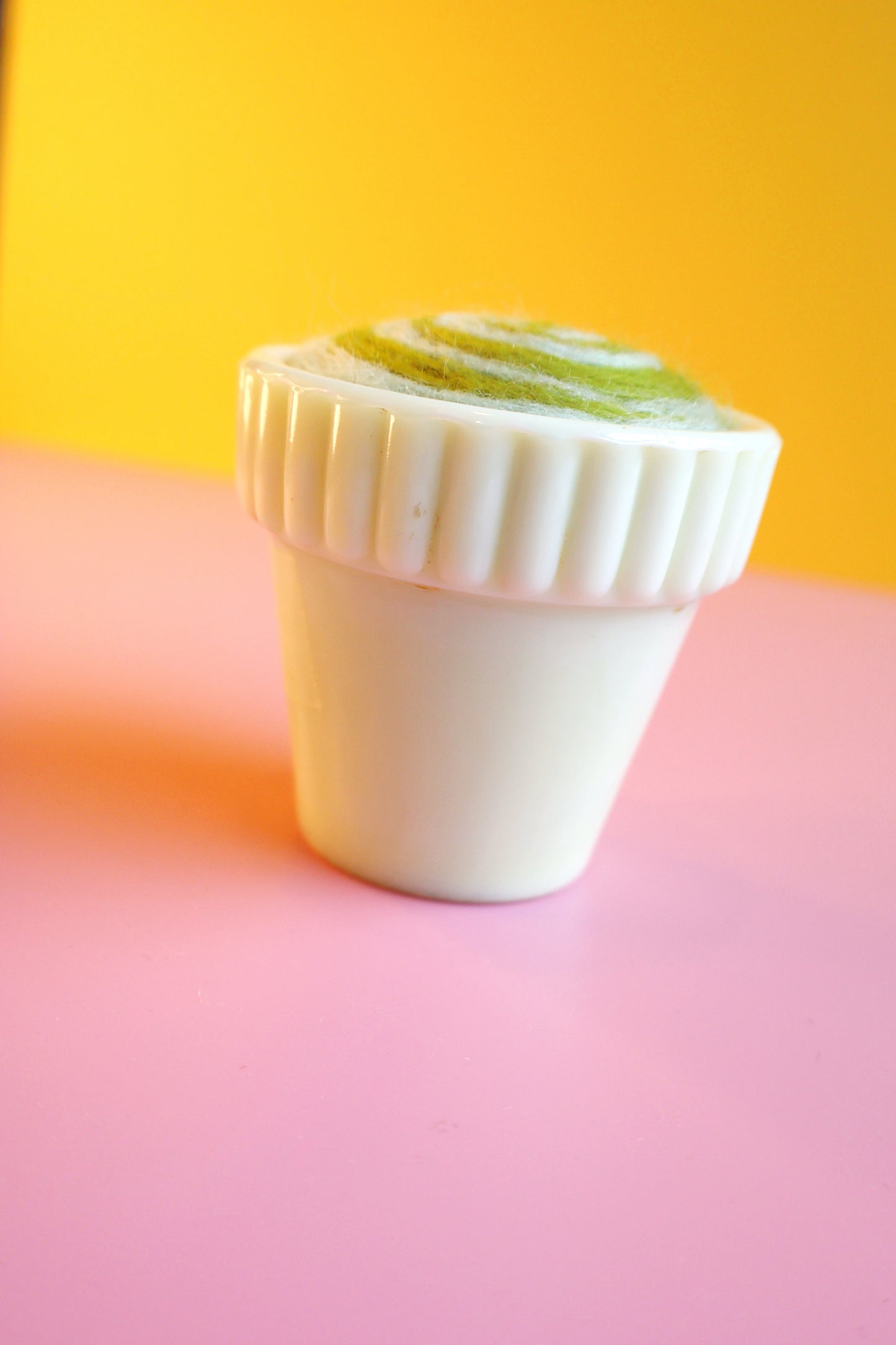 Light green glass and wool pin cushion