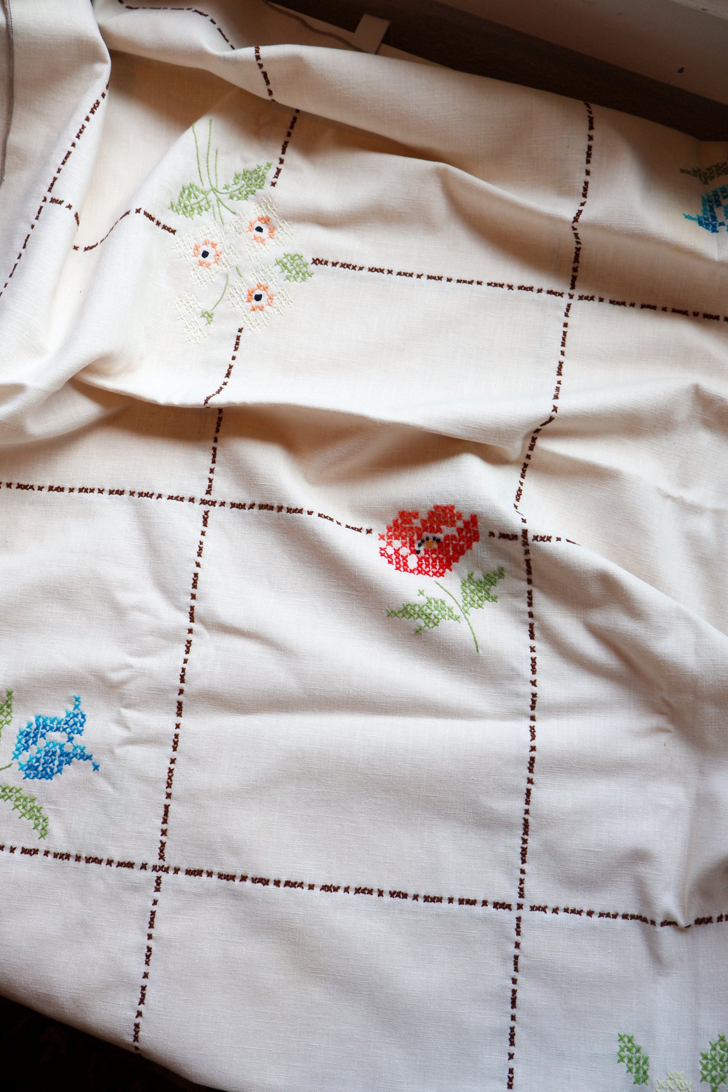 Cross stitch embroidered tablecloth