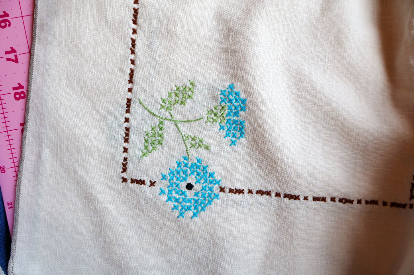 Cross stitch embroidered tablecloth