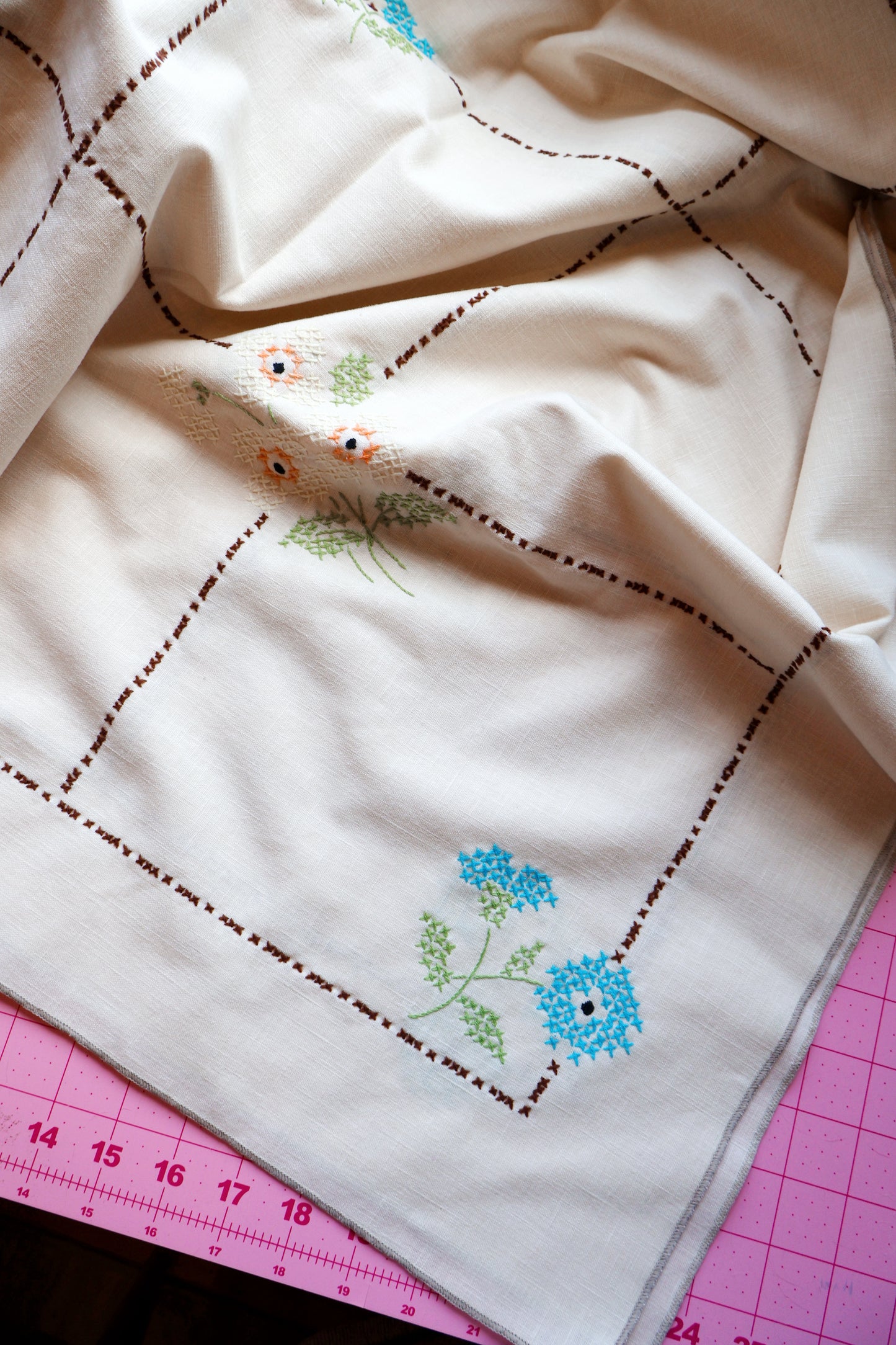 Cross stitch embroidered tablecloth