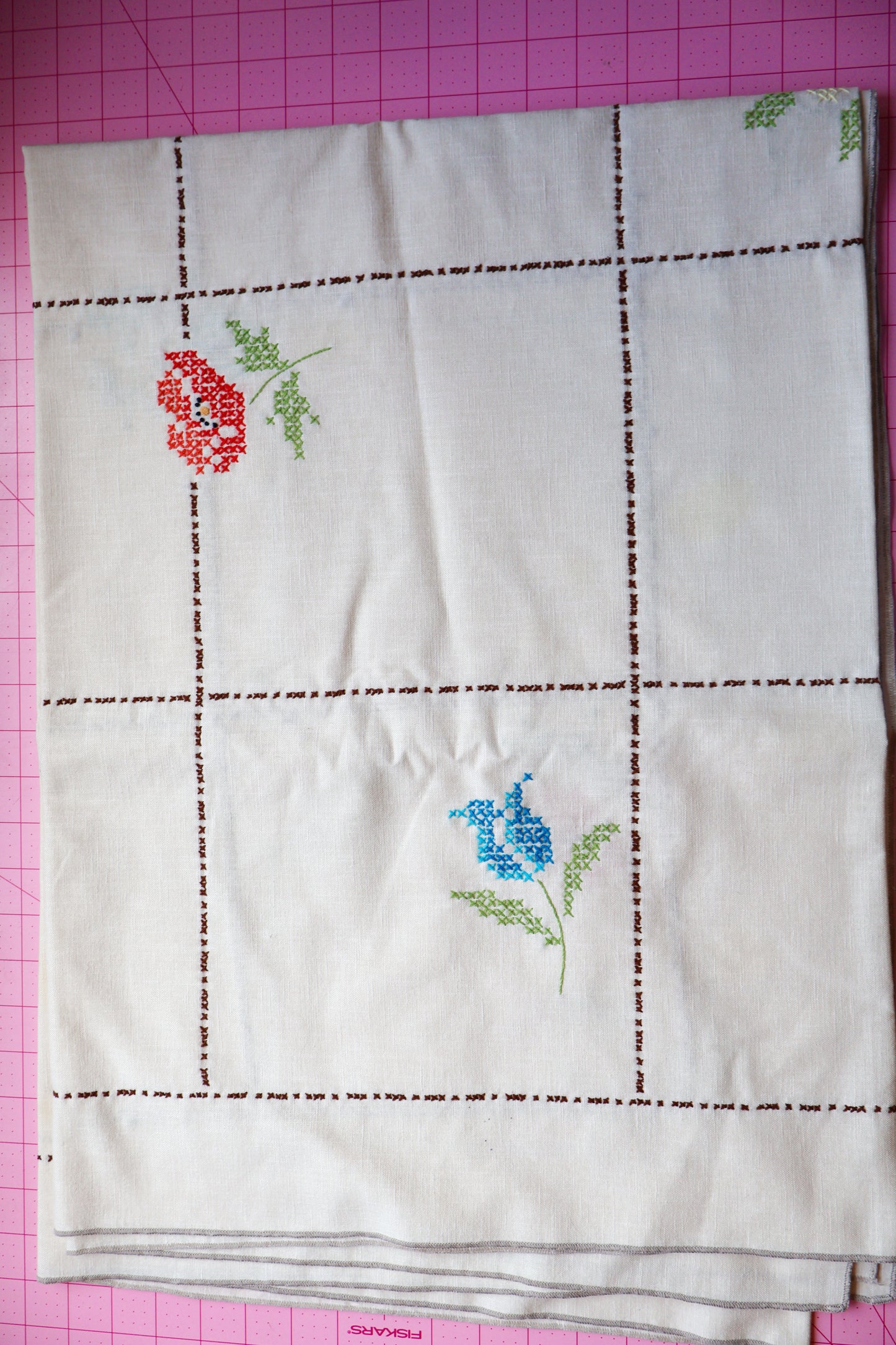 Cross stitch embroidered tablecloth