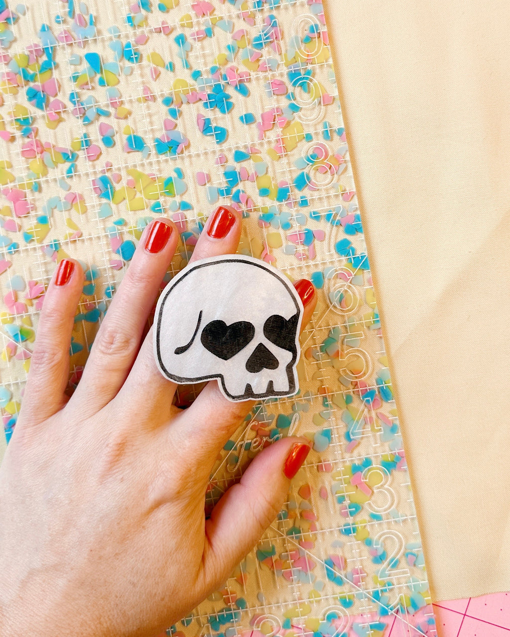 heart eyes skull pop-up ruler handle