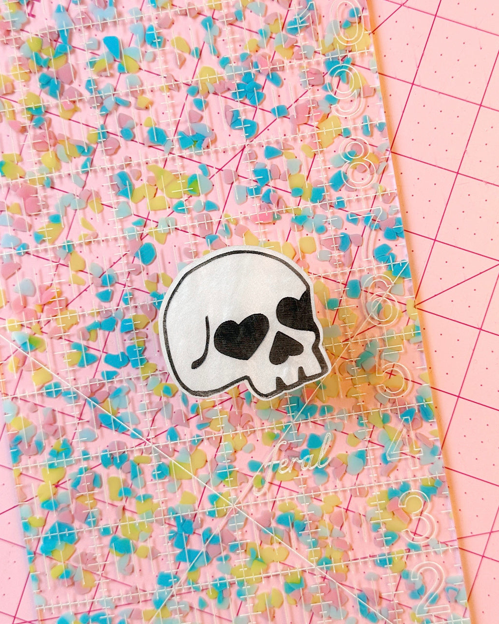 heart eyes skull pop-up ruler handle