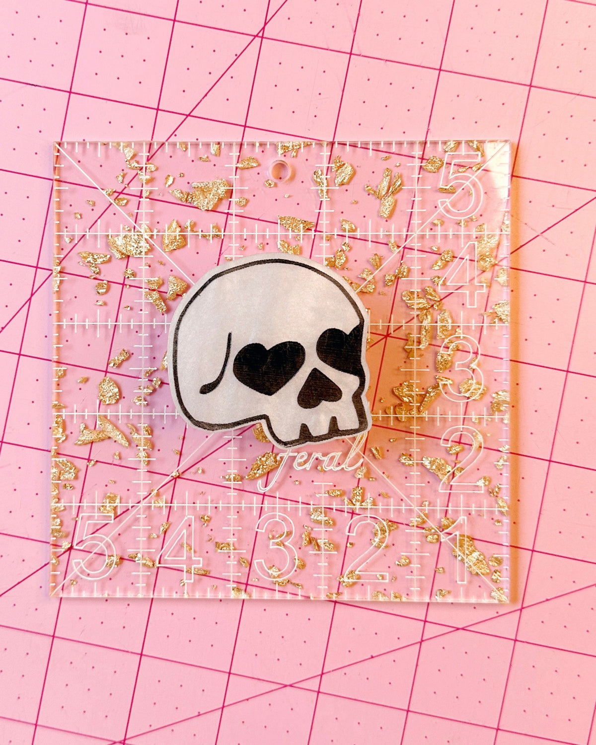 heart eyes skull pop-up ruler handle