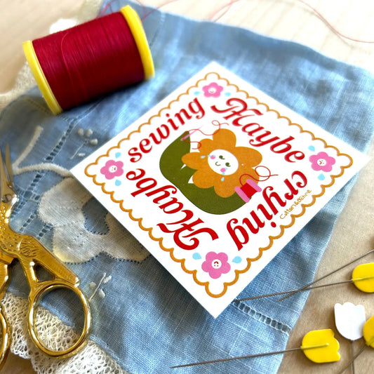 Maybe crying maybe sewing sticker